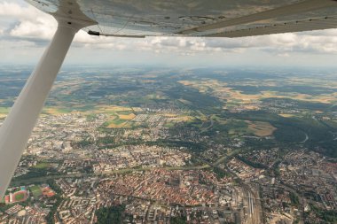 Ulm, Germany, July 9, 2022 City and the historic Church seen from a small plane