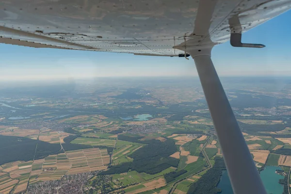 Baden Wurttemberg, Germany, July 8, 2022 Farming fields seen during a flight with a small plane