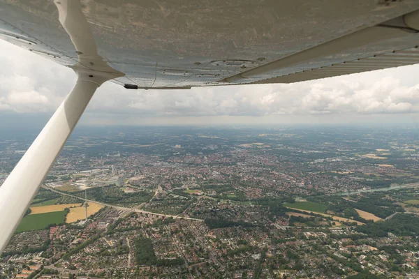 Muenster, Northrhine Westphalia, Germany, July 9, 2022 View over the city from a small plane