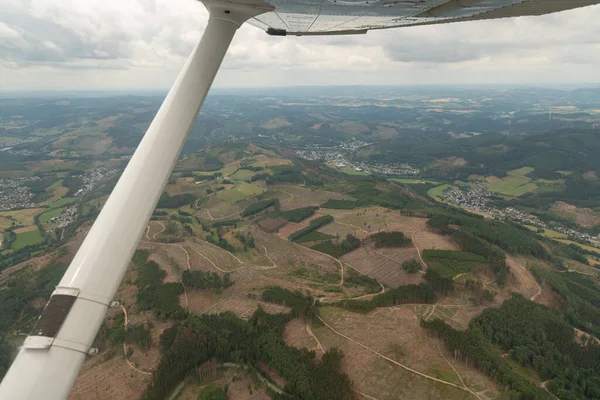 Northrhine Westphalia, Germany, July 9, 2022 Flight over some farming fields with a small plane