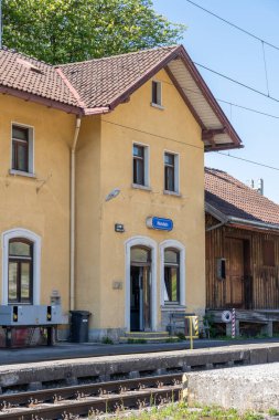Nendeln, Liechtenstein, April, 28, 2022 Front of the old train station building on a sunny day