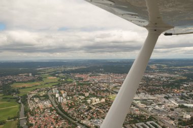 Erlangen, Bavaria, Germany, July 10, 2022 Flight over the city with a small airplane