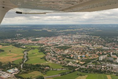 Erlangen, Bavaria, Germany, July 10, 2022 Flight over the city with a small airplane