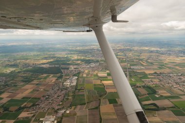 Maxdorf, Rhineland Palatinate, Germany, July 10, 2022 Passing across the city with a small airplane