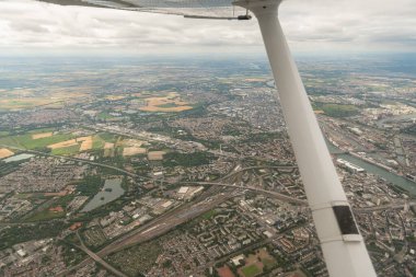 Ludwigshafen, Rhineland Palatinate, Germany, July 10, 2022 Flight overhead the city center with a small plane