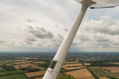 Greven, Northrhine Westphalia, Germany, July 9, 2022 View over the city from a small plane
