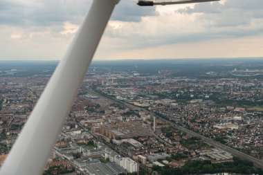 Nuremberg, Bavaria, Germany, July 9, 2022 Flight over the city with a small plane