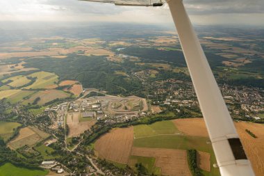 Hohenstein-Ernstthal, Saxony, Germany, July 10, 2022 Flight overhead the saxon ring area with a small plane