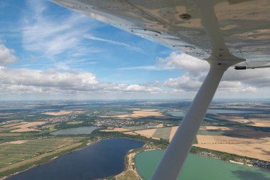 Leipzig area, Saxony, Germany, July 11, 2022 View over the lake Kahnsdorfersee from a small plane