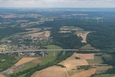 Moeckmuehl area, Germany, July 11, 2022 Highway A81 leading over a long bridge seen from a small plane