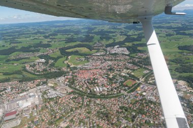 Wangen im Allgaeu, Baden Wurttemberg, Germany, July 11, 2022 Flight along the center with a small airplane