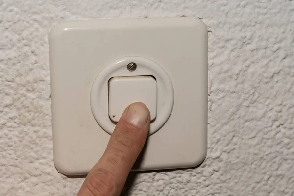 Vaduz Liechtenstein September 2022 Index Finger Pushing Light Switch Apartment — ストック写真