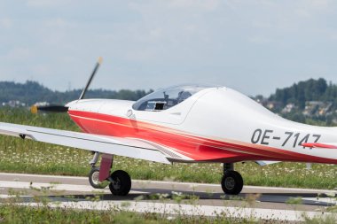 Wangen-Lachen, Switzerland, July 31, 2022 Little propeller plane has just landed on a small airfield