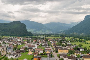 Balzers, Liechtenstein, June 5, 2022 View over the alpine area and the small town on a cloudy day