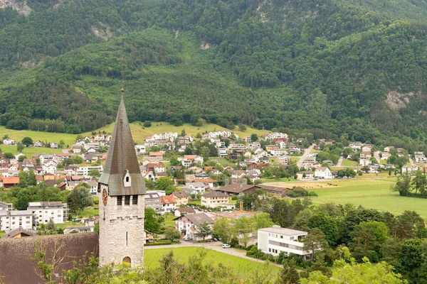 Balzers, Liechtenstein, June 5, 2022 View over the alpine area and the small town on a cloudy day