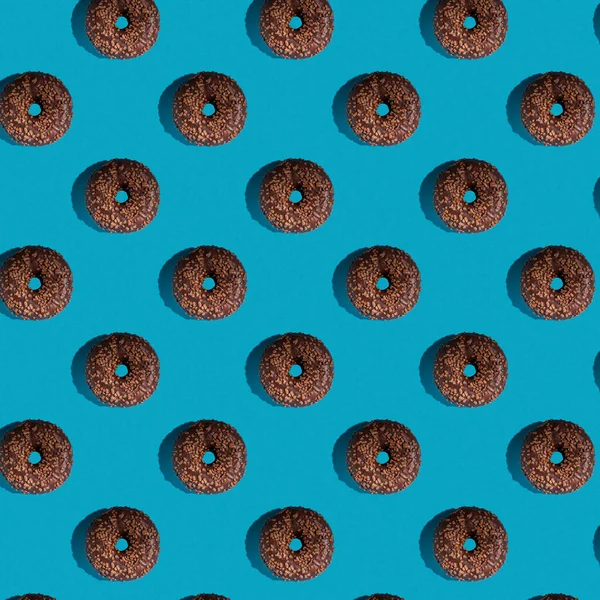 Padrão Deliciosos Donuts Fundo Azul Vista Superior Camada Plana Conceito — Fotografia de Stock