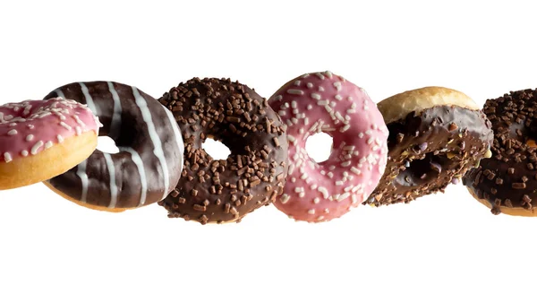 Leviteren Van Een Verscheidenheid Aan Donuts Een Witte Achtergrond — Stockfoto