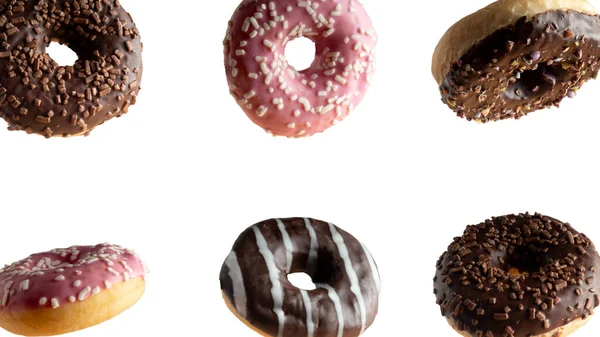 Schweben Einer Vielzahl Von Donuts Auf Weißem Hintergrund — Stockfoto