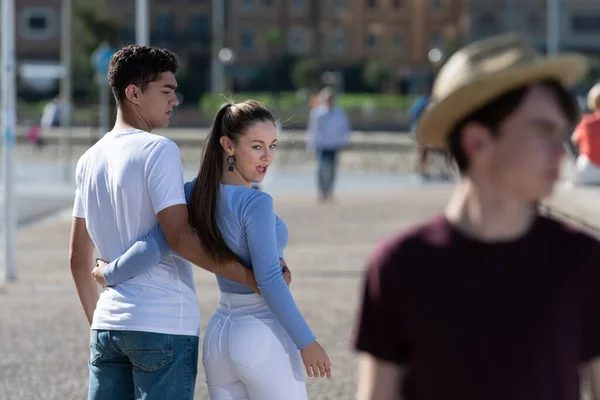 Unfaithful Teenager Girl Walking Boyfriend Looking Another Boy Disloyalty Concept — Stock Photo, Image