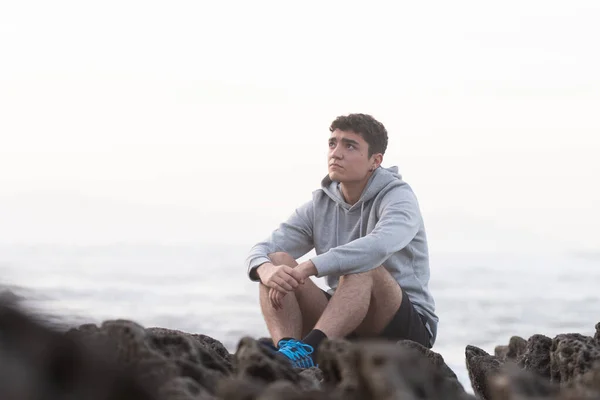 Thoughtful Hispanic Teenager Sitting Outdoors Rocks Depression Anxiety Adolescence Concept — Fotografia de Stock