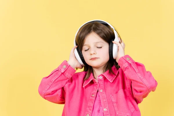 Cute Little Girl Listening Relaxing Music Closed Eyes Headphones Isolated — ストック写真