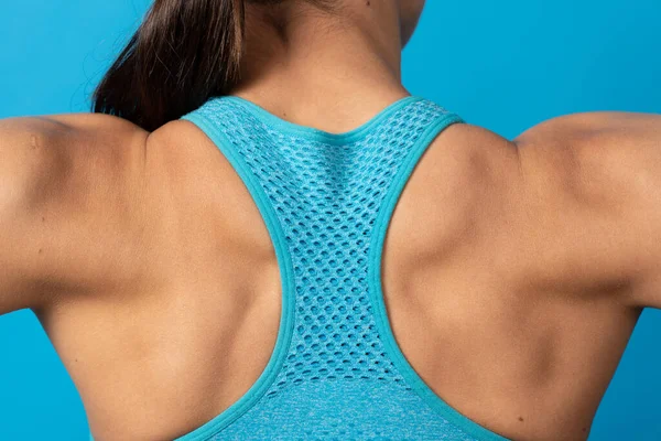 Closeup Muscular Back Hispanic Sportswoman Isolated Blue Background Strong Trapezius — Photo
