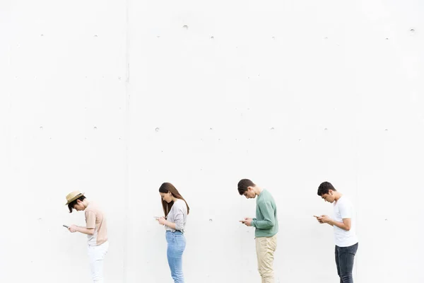 Queue Teenagers Using Phones Bad Posture Lordosis Kyphosis Young People — Stockfoto