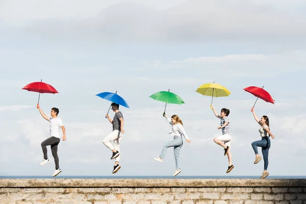 Side View Teenager Friends Jumping Dancing Together Wall While Holding — Stockfoto