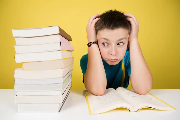 Stressed Student Boy Looking Pile Books Isolated Yellow Background — Fotografia de Stock