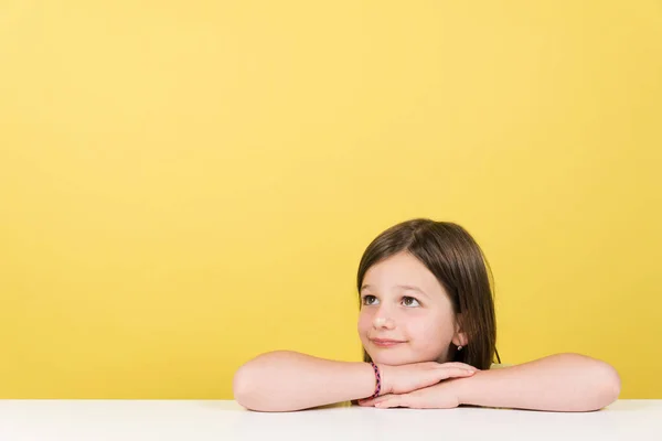 Thoughtful Little Girl Copy Space Isolated Yellow Background Cheerful Child — ストック写真