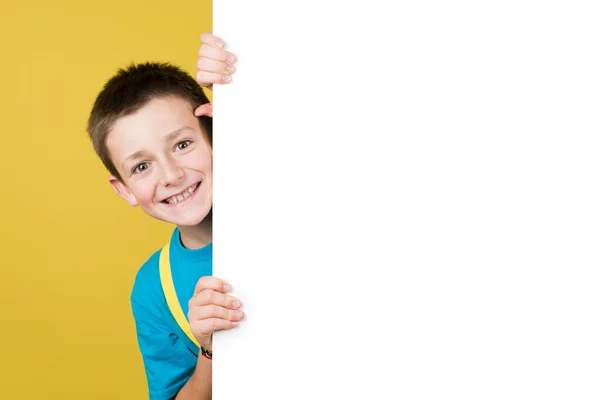 Cheerful Boy Hidden White Billboard Copy Space Royalty Free Stock Photos