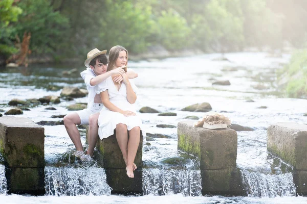 Romantic Teenager Tourist Couple Sitting Middle River Nature Pointing Copy —  Fotos de Stock