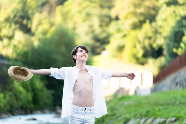 Positive Teenager Tourist Boy Outstretched Hands Feeling Free Breathing Nature — Foto Stock