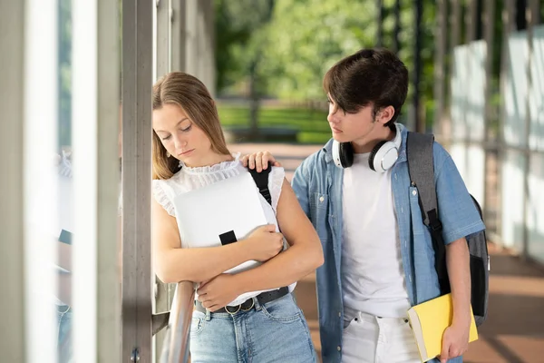 Teenager Student Boy Comforting Pretty Classmate Hall School Failure Depression — Stock Photo, Image