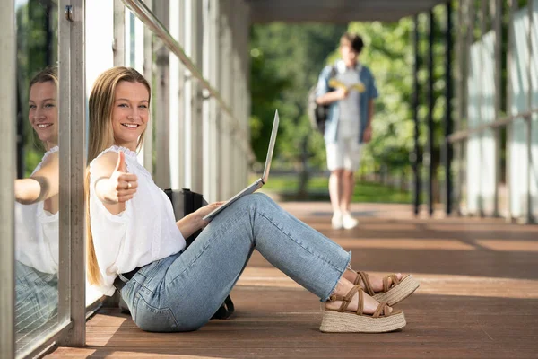 Positive Student Sitting Hall Portrait Pretty Girl Making Sign Smiling — Stockfoto