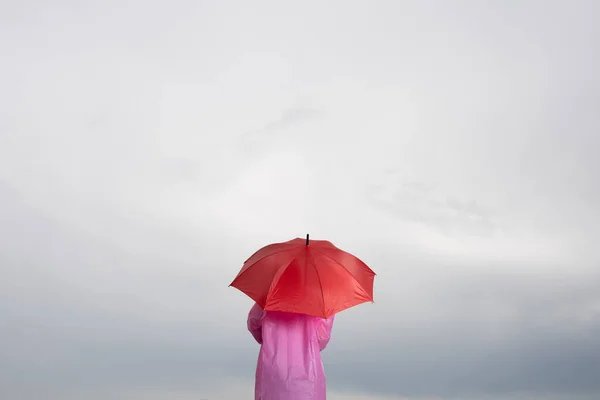 Rear View Person Holding Red Umbrella Cloudy Sky Bad Weather — 스톡 사진