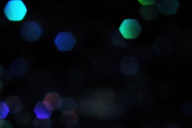 dark, pink and blue bokeh lights. vintage background with color festive pattern. glowing magic backdrop with natural