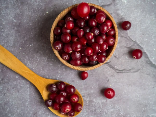 Ripe Fresh Cranberries Wooden Bowl Wooden Spoon Concrete Table Top — Stock Photo, Image