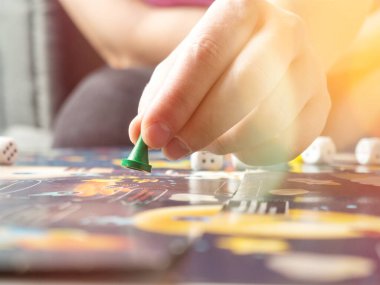 board games concept. Dice, chips and cards on the background of the playing field copy space