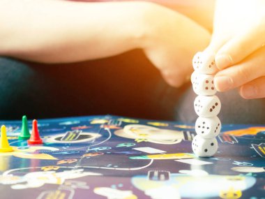 board games concept. Dice, chips and cards on the background of the playing field copy space