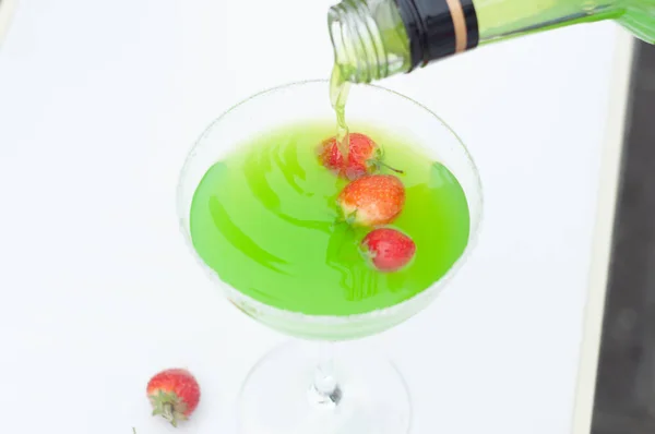 Colorful bright green cocktail cactus with strawberries, delicious refreshing — Stock Photo, Image
