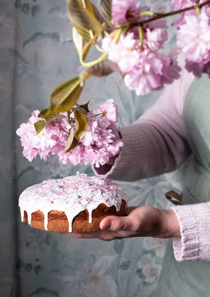 Woman Decorates Homemade Easter Cake Pink Sakura Flowers Spring Blossom — Stock Photo, Image