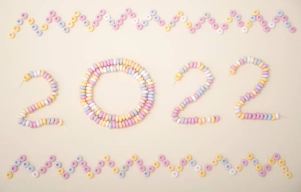 Figures Year 2022 Lined Pastel Colors Candies Lettering High Quality — Stock Photo, Image