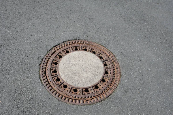 Old Iron Metal Manhole Cover Sewer Cap City Street Asphalt — Stock Photo, Image