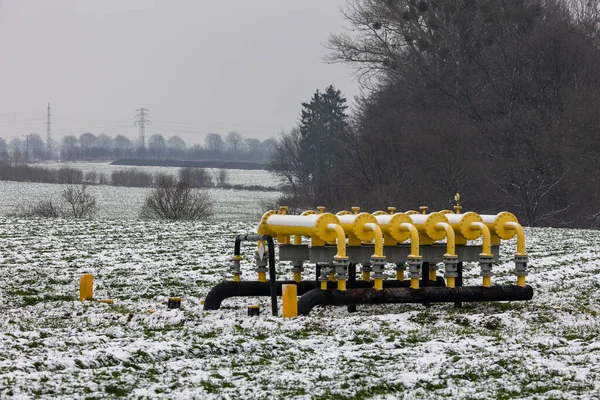 Yellow Gas Infrastructure Elements Sticking Out Ground Winter Photo Snow — Stock Photo, Image