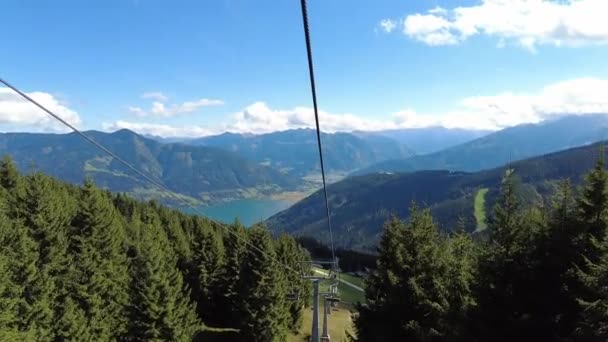 Sitting Chair Lift Goes Tall Spruce Trees Summer — Stock Video