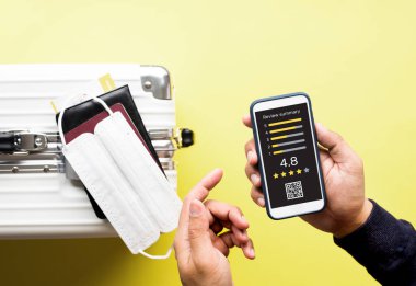 Consumer reviews concepts with review score and smartphone.rating or feedback for evaluate.travel and holiday