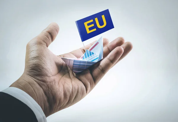 Close Male Hand Holding Boat Paper Graph European Union Word — Stock Photo, Image