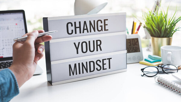 CHANGE YOUR MINDSET with business person.inspiration and motivation concepts.