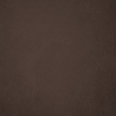 Karanlık duvar arkaplanı. Soyut bir paketin önünde boş bir işyeri. Kahverengi arka plan tozlu. Eski fiyat, çimento veya alçı dokusu. İç..